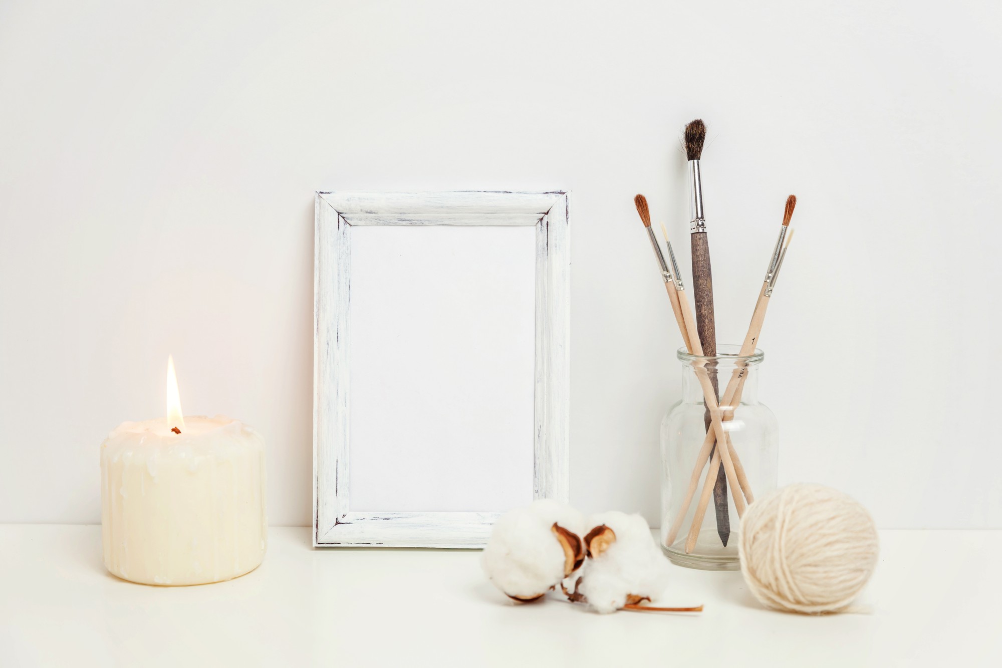 Interior of embroidery atelier with wooden frames and threads