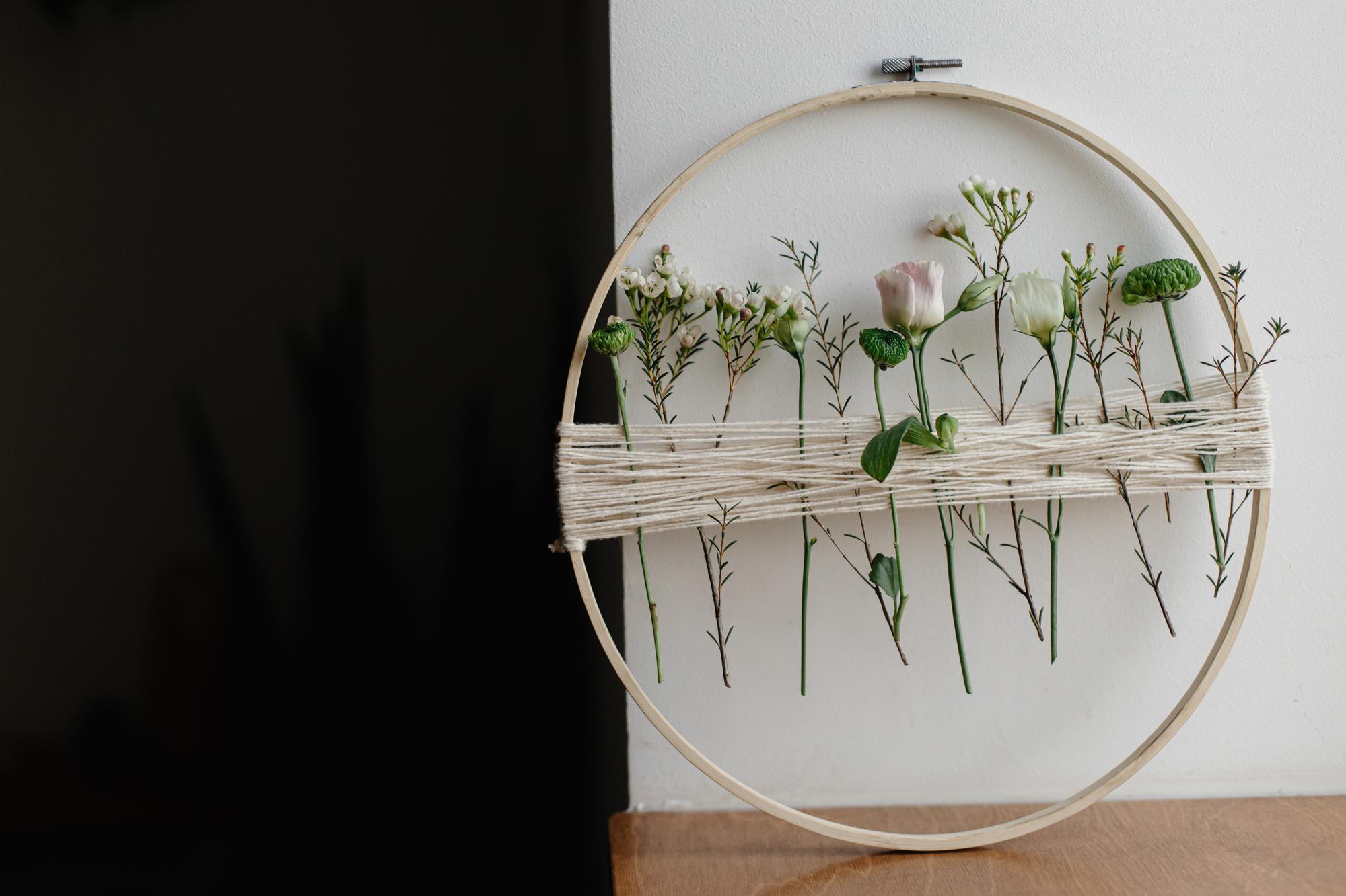 Framed floral embroidery with metallic thread